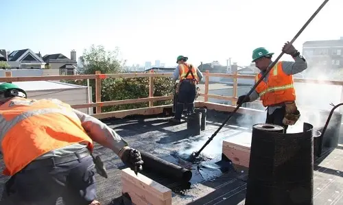 Built up roof system being installed by commercial contractor Benton Roofing