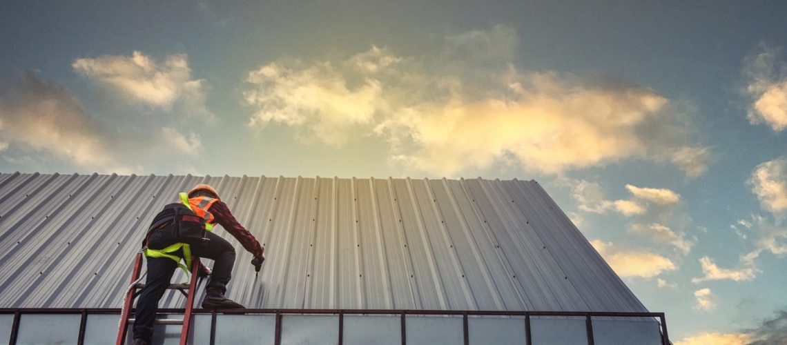 worker-man-building-tradesman-roof-house-with-safety-helmet